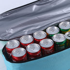 Insulated cooler compartment open showing canned drinks and thermal lining