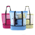Three mesh beach totes with insulated cooler bottom in pink, blue, and yellow